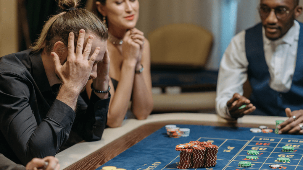 Gambler loosing in roulette table